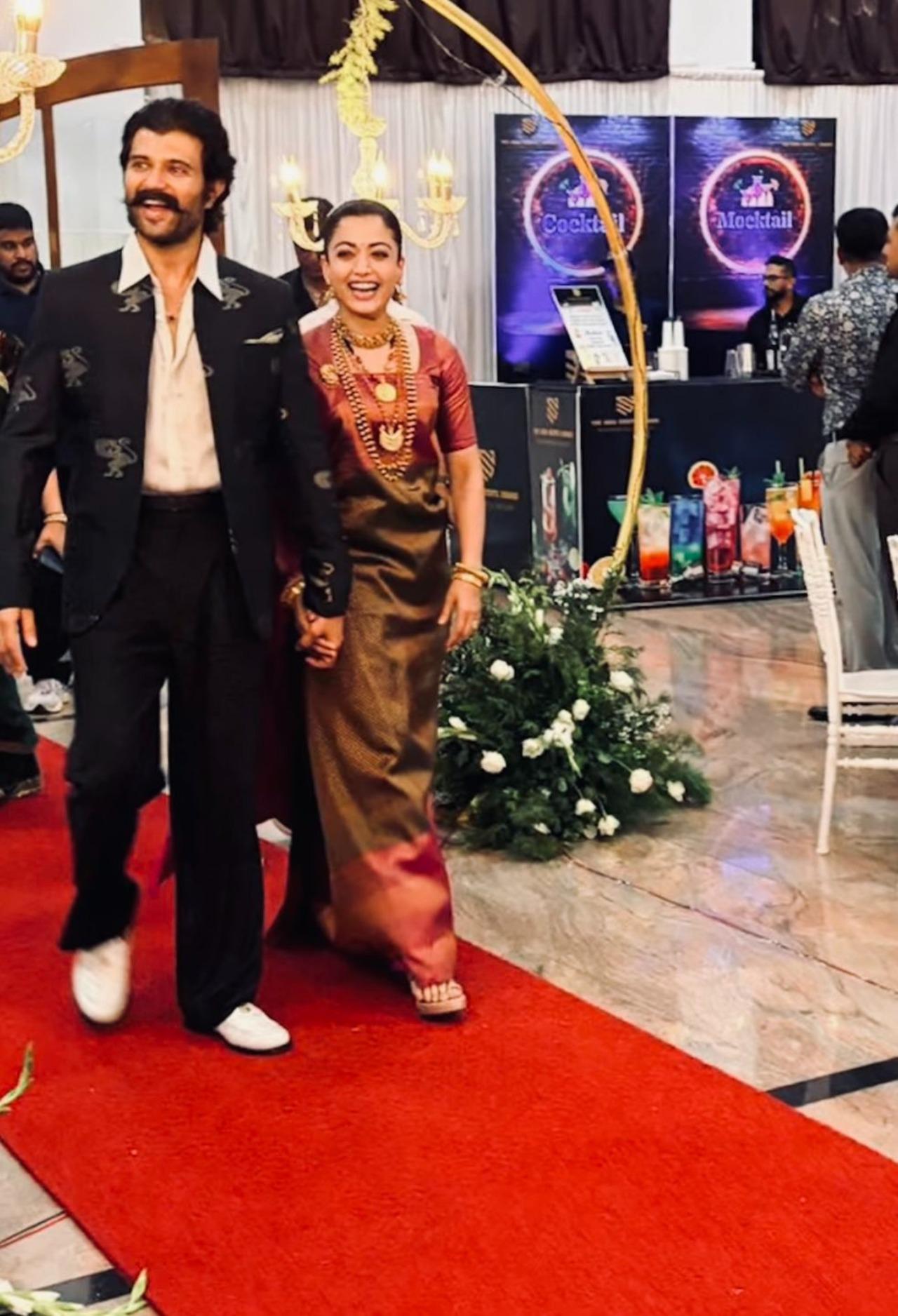 <p>Vijay and Rashmika were all smiles as they walked in to their reception venue in Coorg.</p> <p>Vijay and Rashmika were all smiles as they walked in to their reception venue in Coorg.</p>