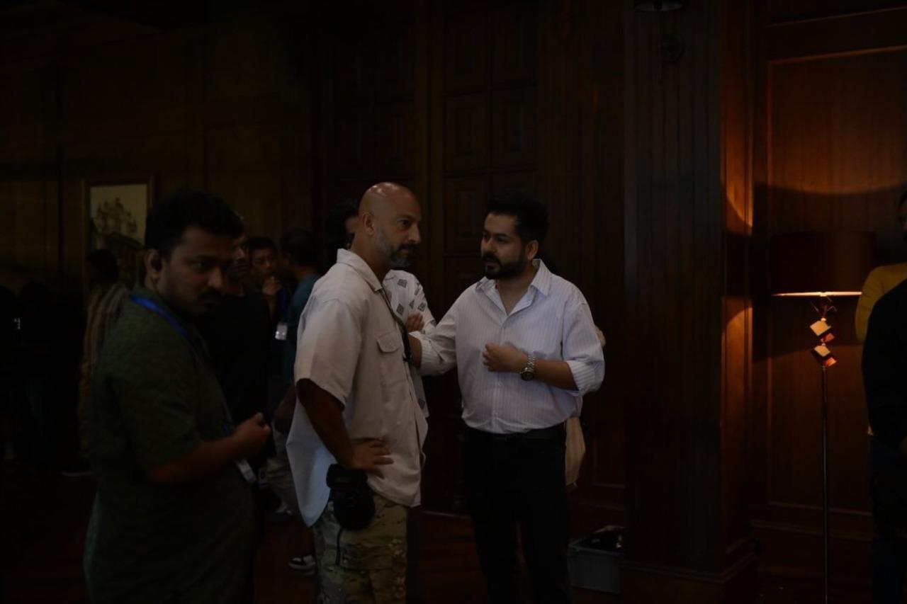 <p>Vikash and Aditya are seen engrossed in a deep conversation, presumably about a shot, in this candid picture.</p>