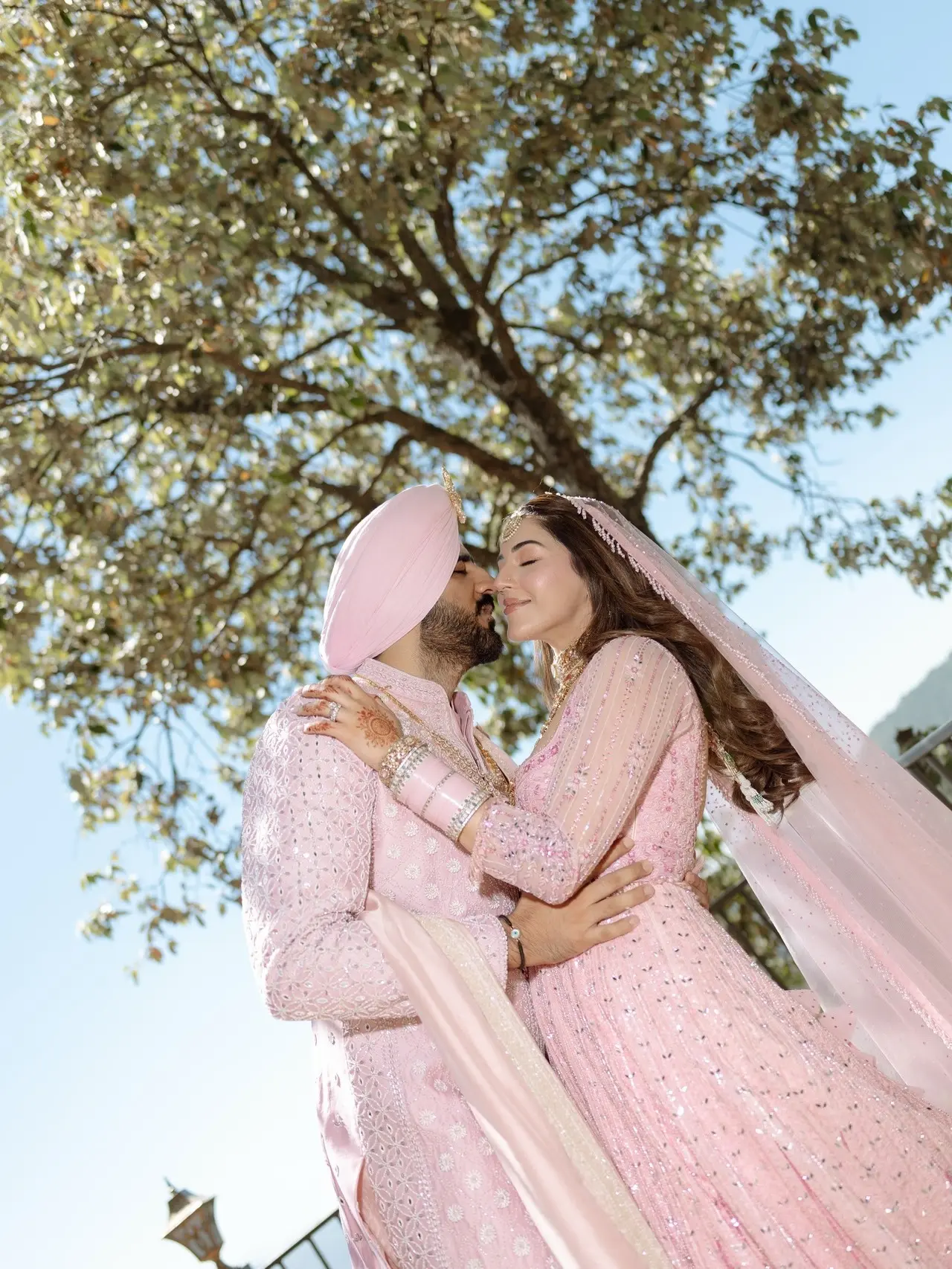 For her big day, Mehreen chose a stunning blush-pink lehenga embellished with intricate sequin work, exuding classic bridal charm.&nbsp;