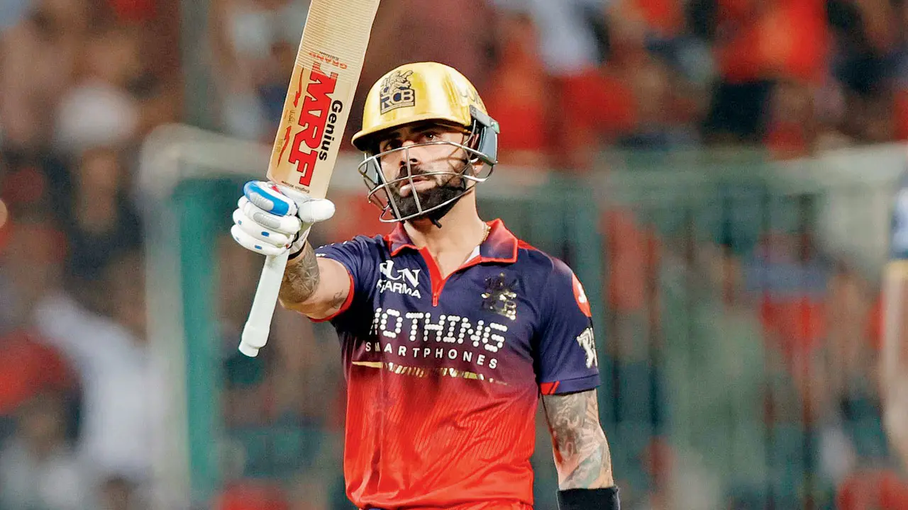 RCB’s Virat Kohli celebrates his half-century against GT in Bengaluru on Friday. Pic/IPL