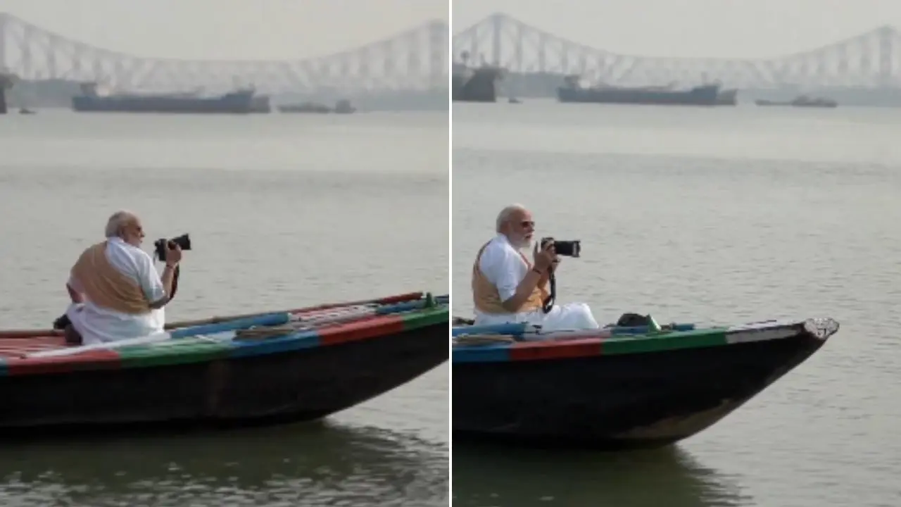 Prime Minister Narendra Modi takes a boat ride in West Bengal's Hooghly river on Friday. Pic/ PM Modi on X