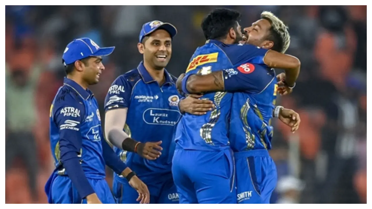 Mumbai Indians' players celebrating a wicket during the match (Pic: AFP)