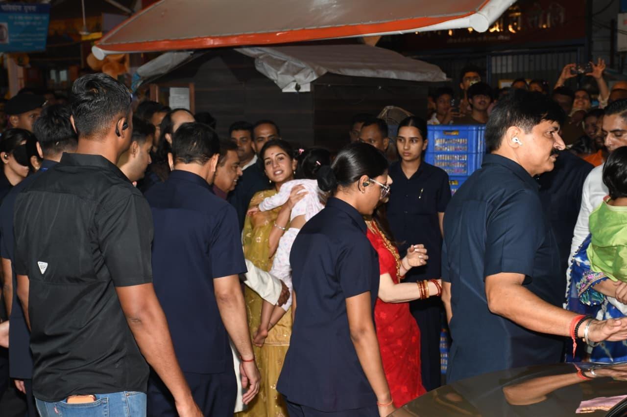 Radhika Ambani reaches in a mustard yellow attire with family