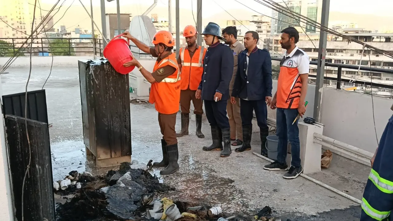 IN PHOTOS: Fire breaks out at terrace store room of Thane building