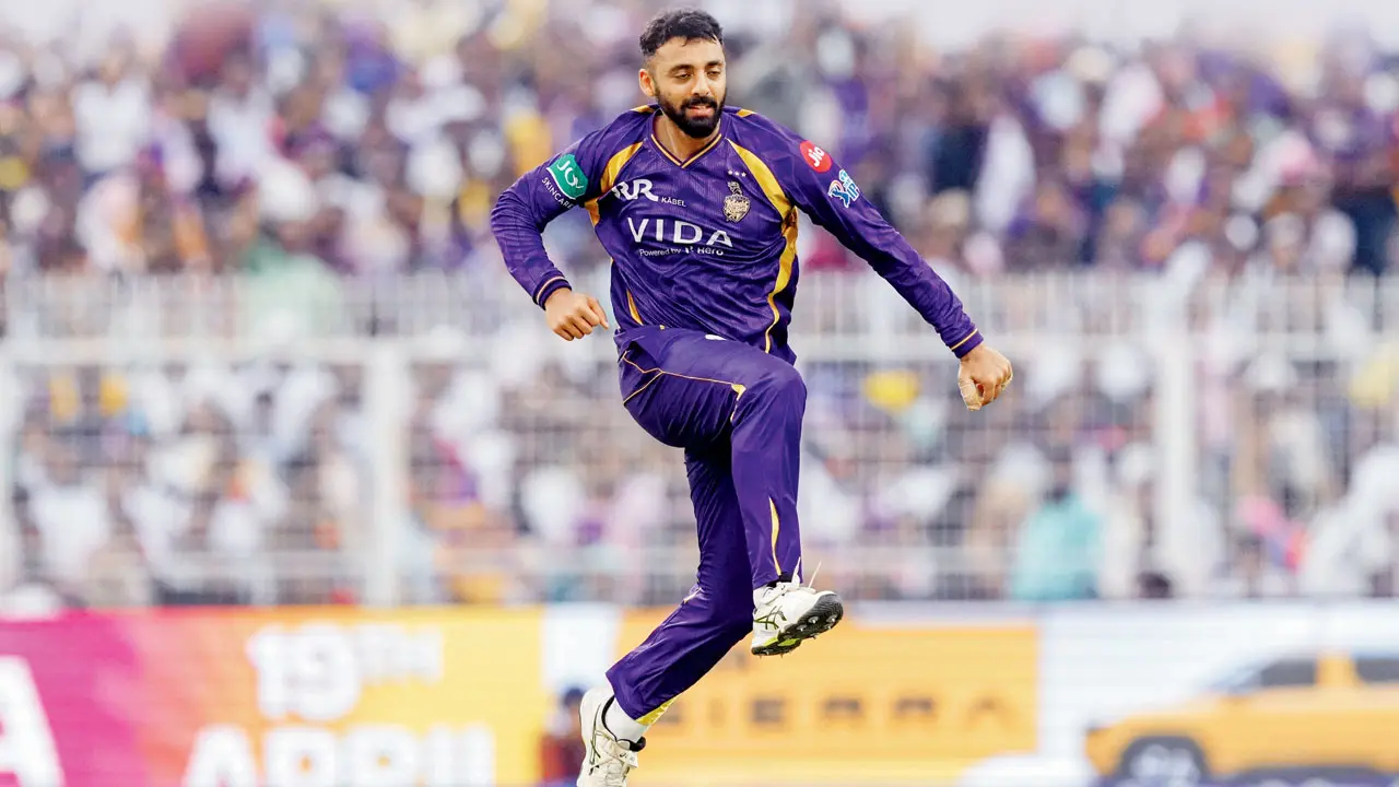 KKR’s Varun Chakravarthy celebrates the wicket of RR captain Riyan Parag in Kolkata on Sunday. Pic/PTI