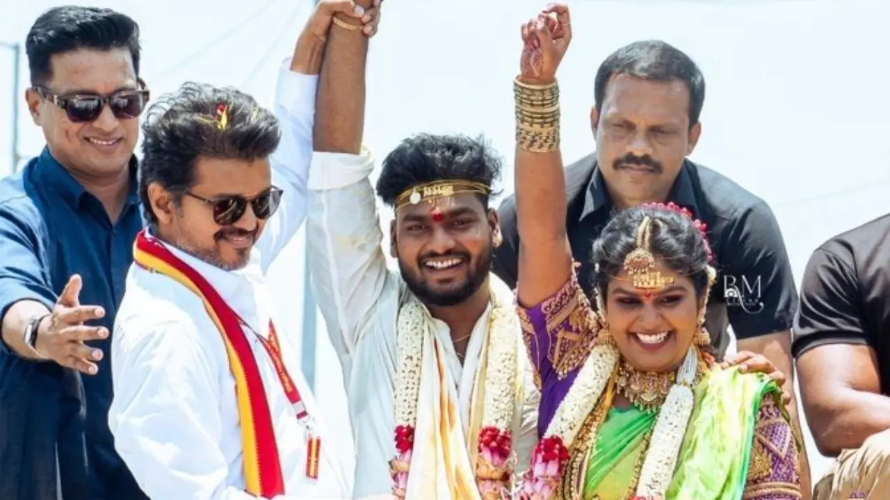 Thalapathy Vijay with a newly-married couple