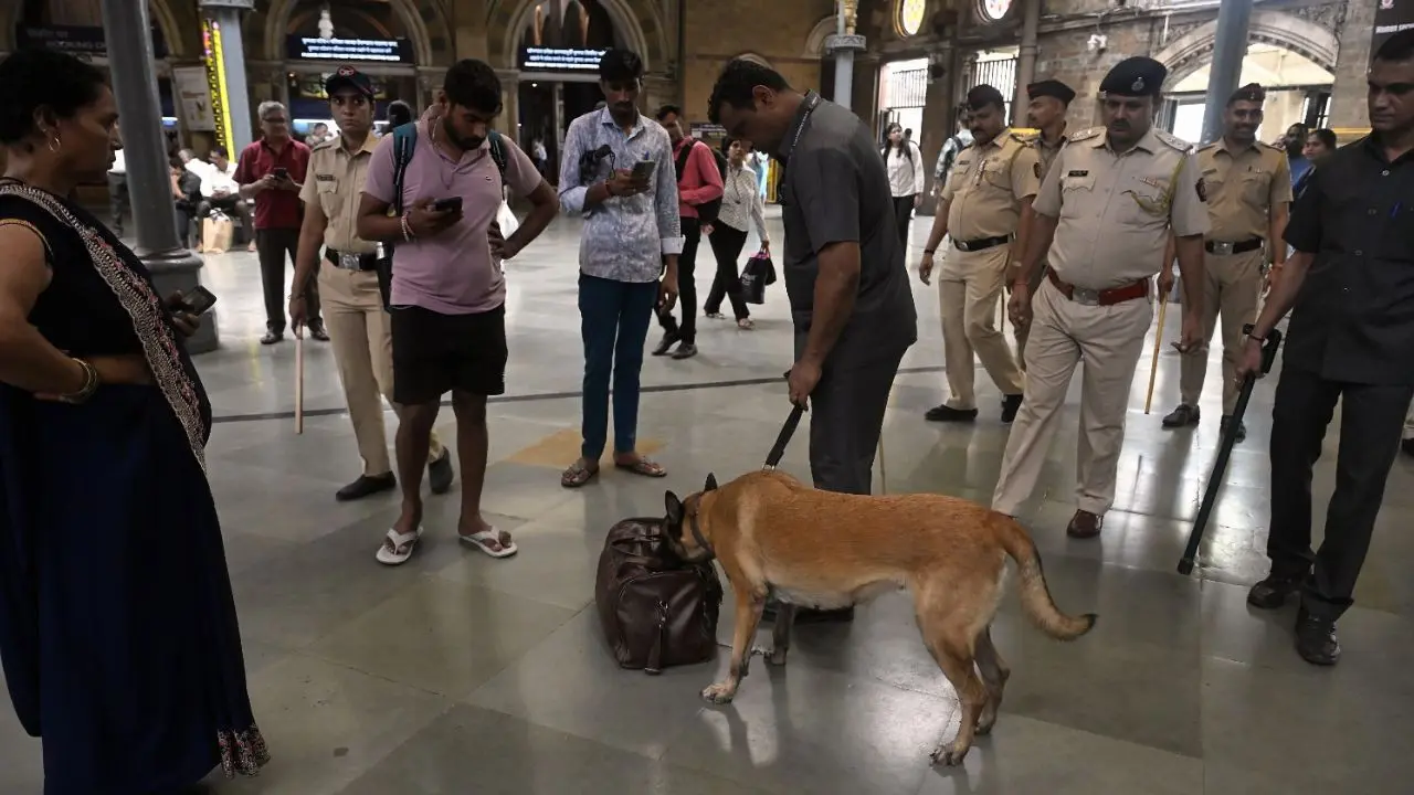IN PHOTOS: Mumbai on high alert after bomb threat email Security was heightened across Mumbai's key facilities and transport networks after a threatening email warned of bomb blasts