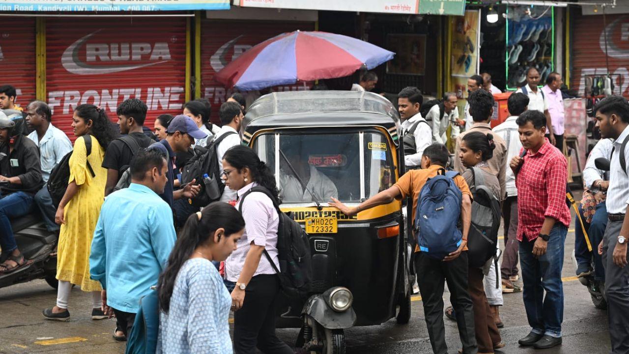 IN PHOTOS: Limited metered autos cause commuter woes in Mumbai Mumbai commuters faced difficulties during the early hours of Monday as fewer metered auto-rickshaws were available near Kandivali and Malad railway stations