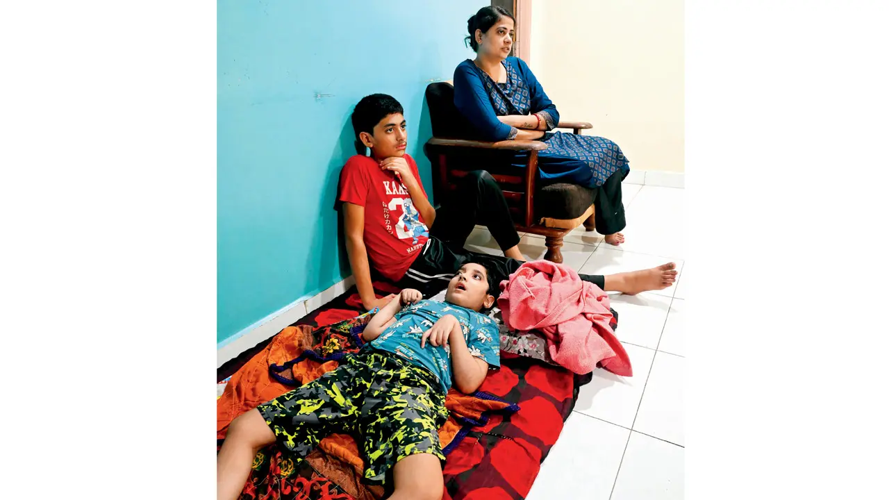 Mid-Day Special: ‘I cannot leave Aahan’; Mother’s five-year battle caring for son with incurable SSPE Aahan with his mother Madhuri and cousin Varad at their home in Vanjanwadi, Karjat