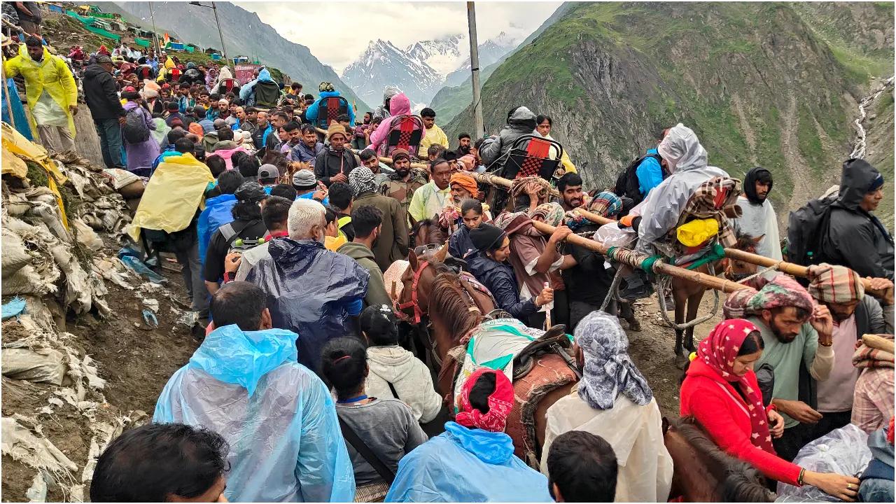 J-K: Amputee makes pilgrimage to temple on tricycle; man crawls to Amarnath cave Amarnath cave shrine. Photo Courtesy: PTI