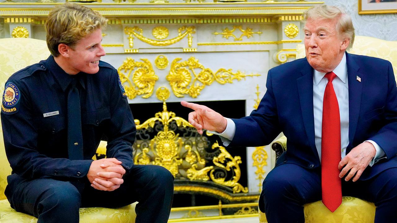 Trump honours teen lifeguard after beach rescue President Donald Trump speaks to lifeguard Ryder Williams at the White House on Tuesday. Pic/AP/PTI