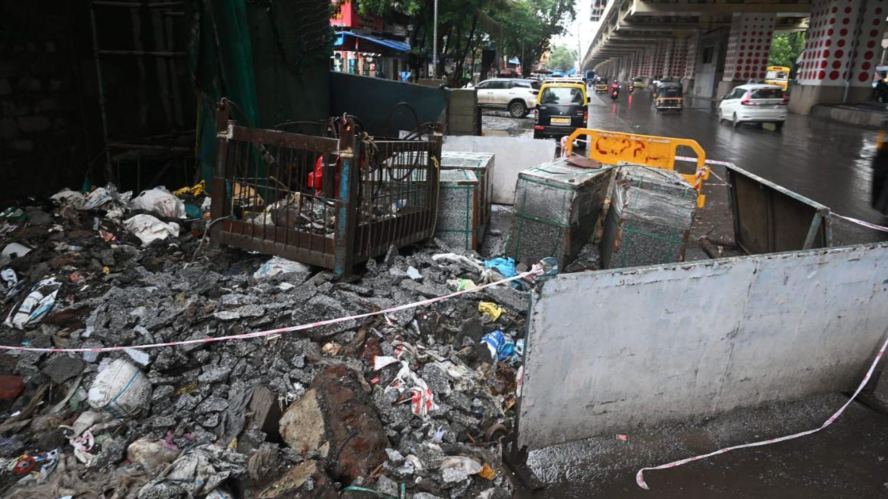 IN PHOTOS: Granite stones fall from Mumbai Metro Line-9 worksite in Mira Road Granite floor pieces fell onto the road from the under-construction Medetiya Nagar Station of Metro Line-9 on Mira-Bhayandar Road at Queens Park, Mira Road East, on Monday. PIC/SATEJ SHINDE