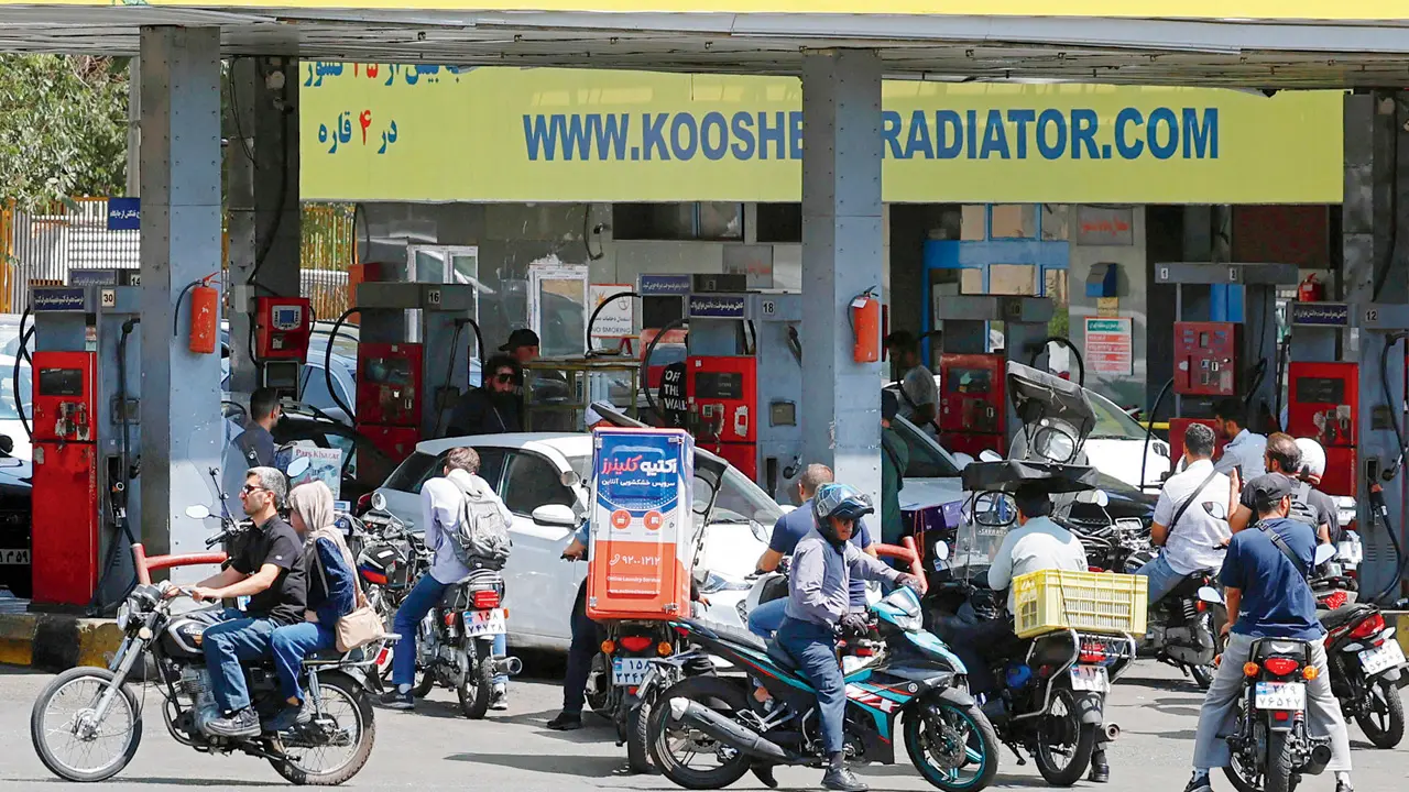 Motorists queue at a petrol station to refuel in Tehran on Tuesday, after Washington announced that it was preparing expanded sanctions targeting Iran’s digital assets, technology, and shipping sectors. PIC/AFP