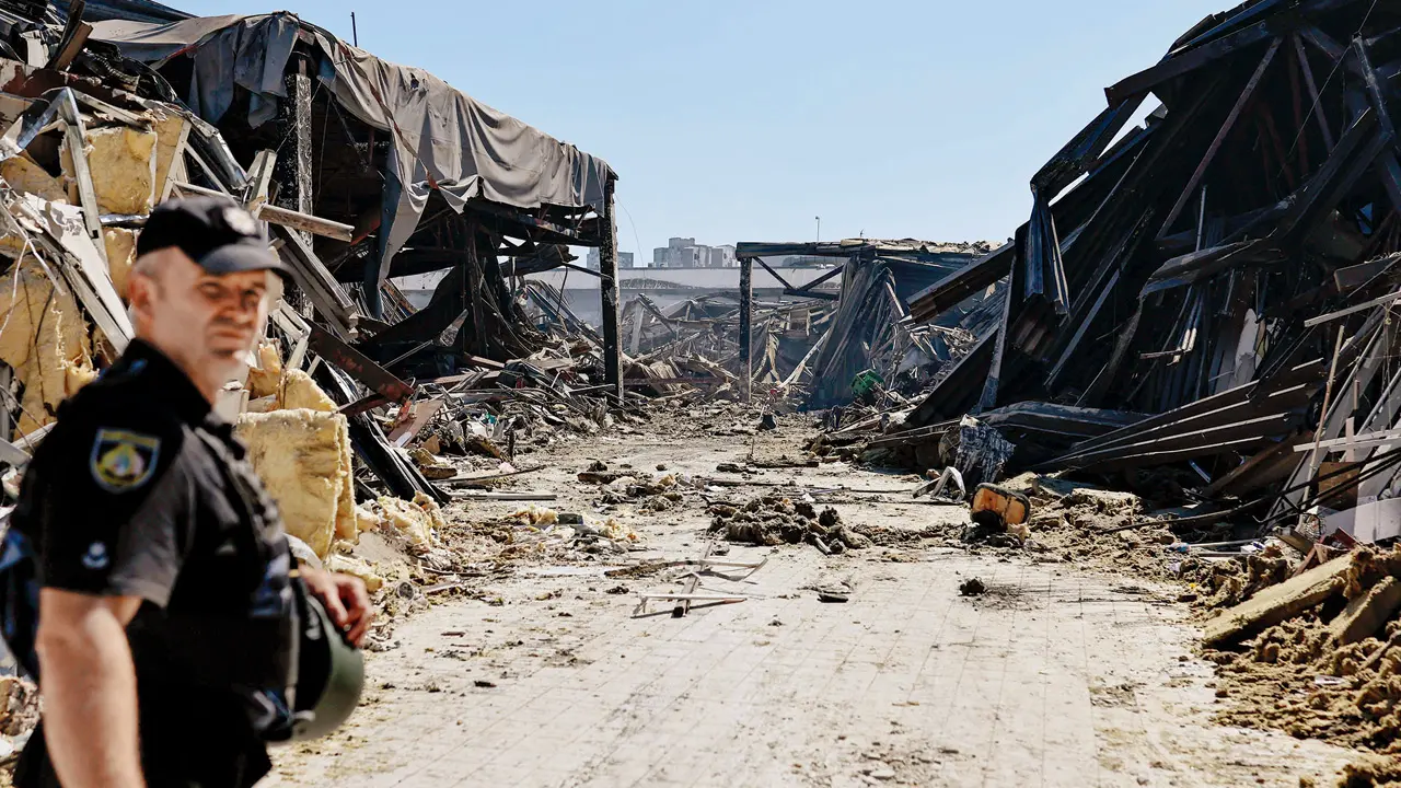 Russia intercepts 250 Ukrainian drones in 12 hours, Defence Ministry says A police officer walks at the site of a shopping mall damaged following a Russian strike in Kryvyi Rih. PIC/AFP