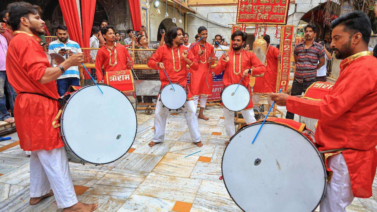 The devotion across north India took different forms as artists performed music with drums while observing the first 'Monday' of the holy month of 'Sawan', at Tadkeshwar Mahadev Temple, in Jaipur on Monday