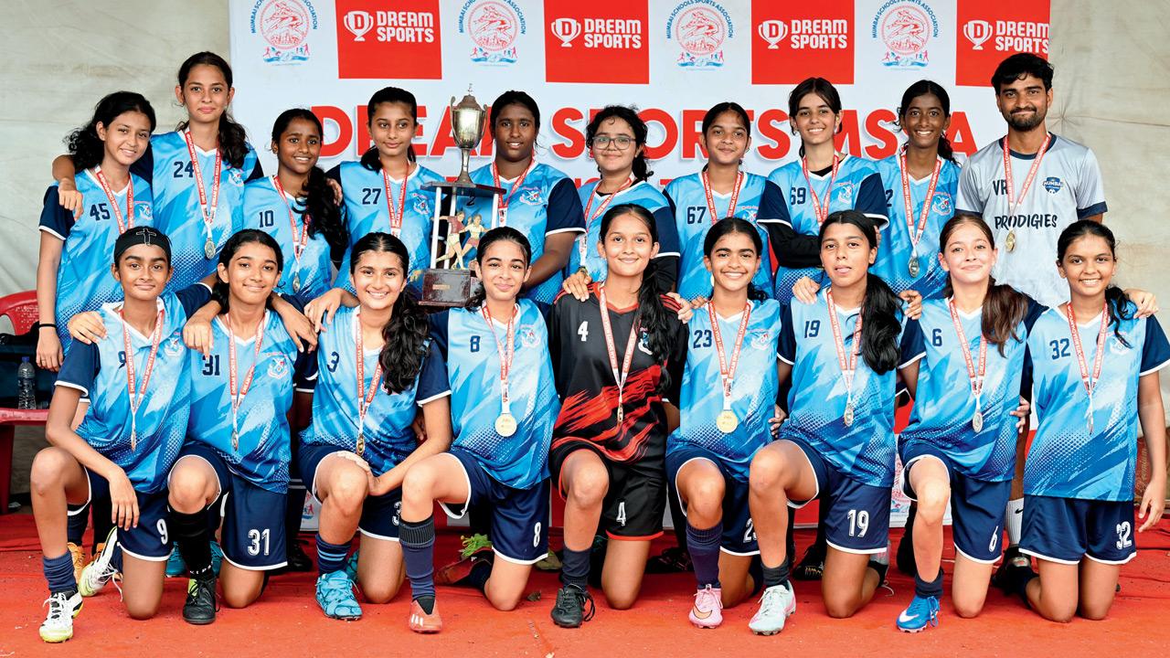 Bombay Scottish players celebrate with the winners’ trophy in Bandra on Friday. PIC/ATUL KAMBLE
