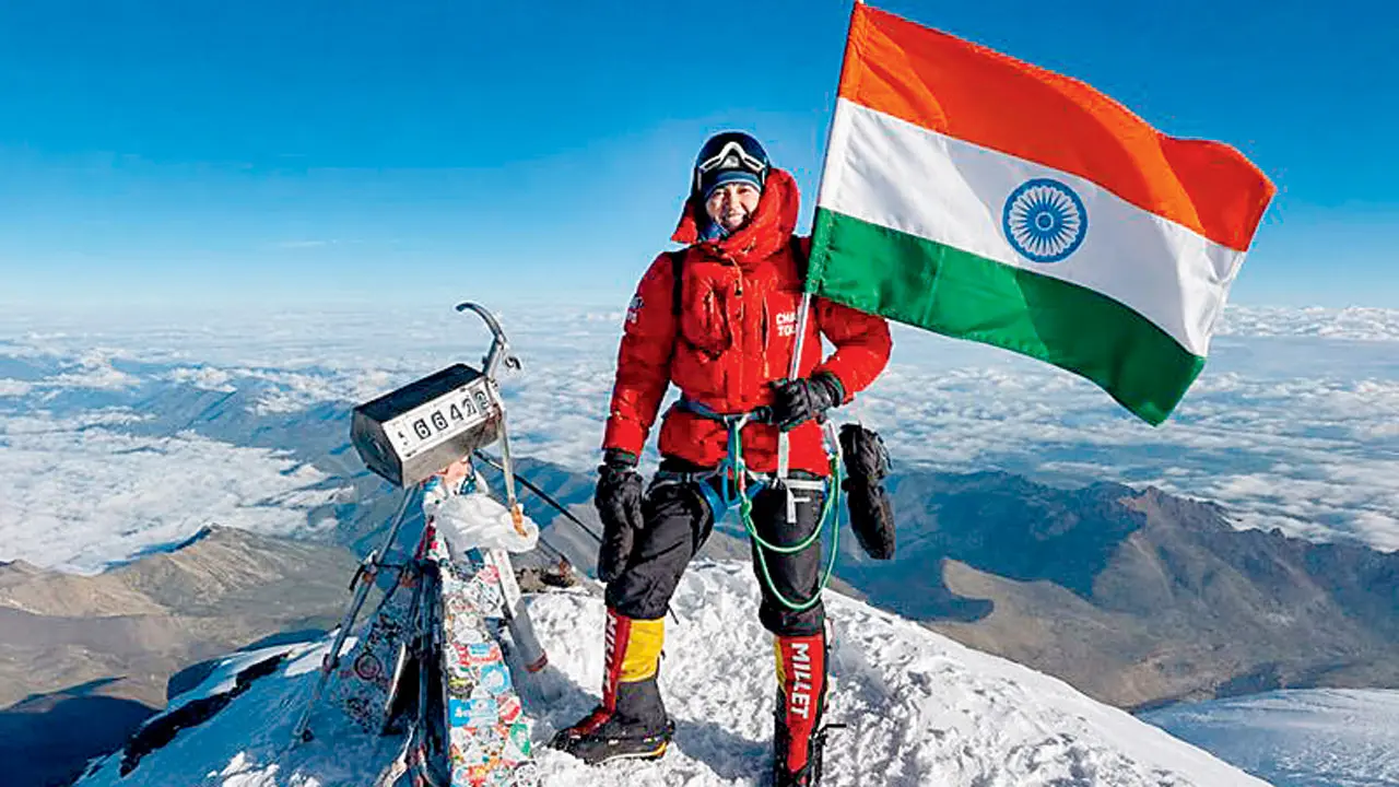 Mumbai mother, 43, unfurls Tricolour atop Mount Elbrus on Independence Day Shivani Mehrotra climbing at 43. PIC/X/@DailyExcelsior1