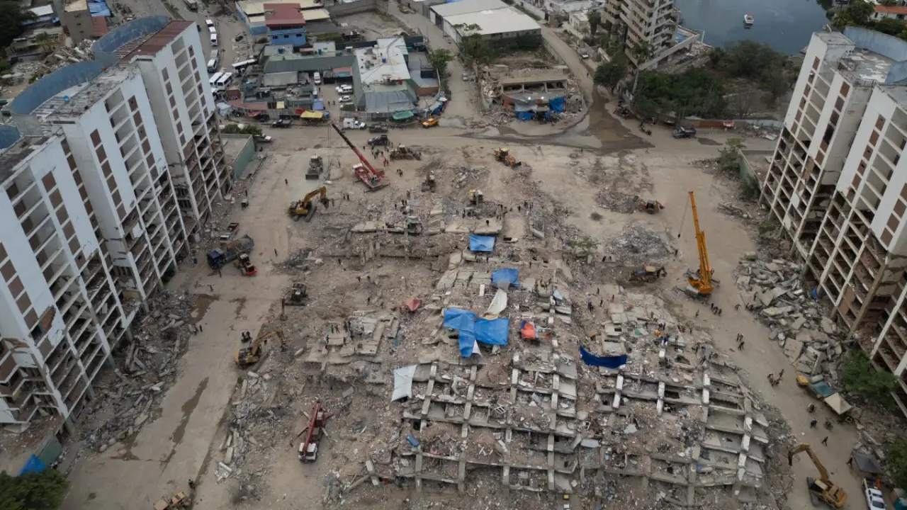 Venezuela earthquake: Toll hits 6,438; authorities inspect 59,109 buildings Aerial view shows heavy machinery clearing the rubble of collapsed buildings after the June 24, 2026, earthquakes along the coastal strip in Caraballeda, La Guaira state, Venezuela. PIC/AFP