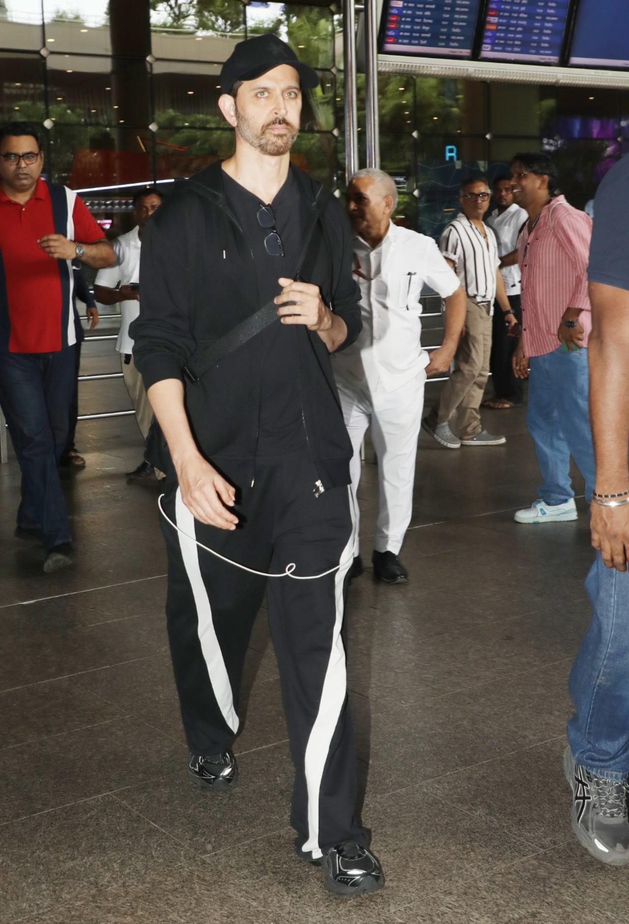 Amid all the controversy, Hrithik Roshan appears at the airport in a comfy tracksuit, fans wonder what does he have to reply to those posts and Kangana's reaction