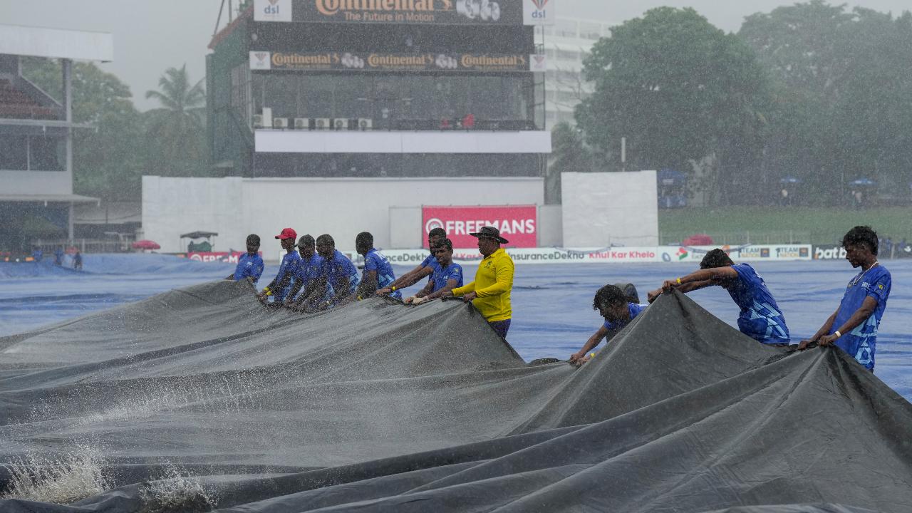 The tea break was announced early due to persistent rain, following which ground staff brought out the covers in Colombo (Pic: PTI)