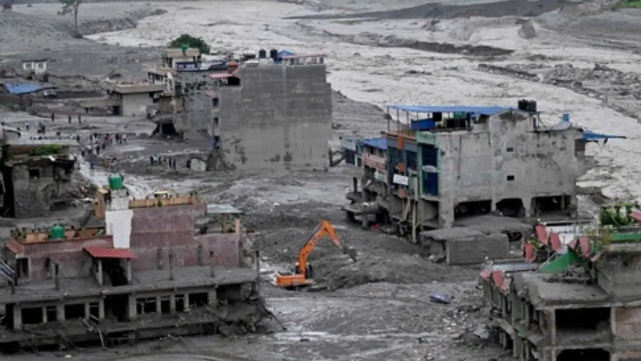 In Photos: Nepal flood aftermath scenes of destruction grief and recovery Rescue work continue in the aftermath of flash floods at Trishuli Center in Nepal's Nuwakot district. Pic/AFP