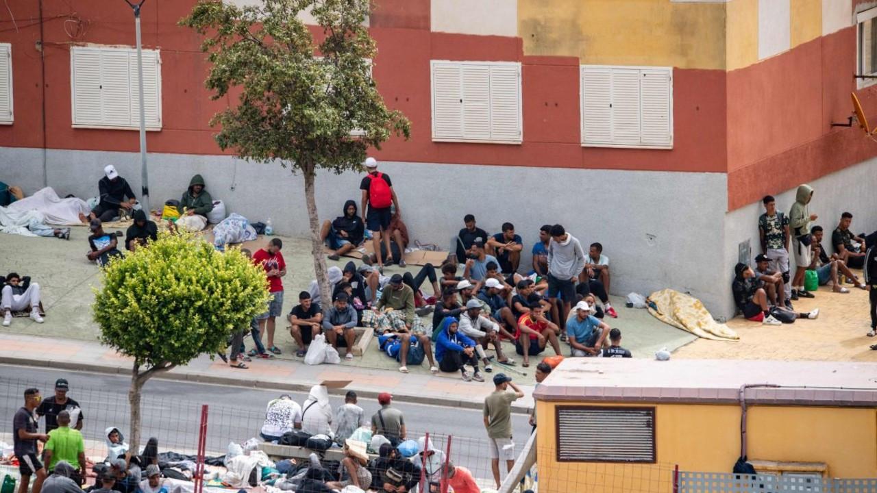 IN PHOTOS: Migrant crisis deepen in Spain's Ceuta Twelve Moroccan nationals were arrested after a military vehicle carrying Spanish soldiers was pelted with stones, injuring one soldier. (PICS/AFP)