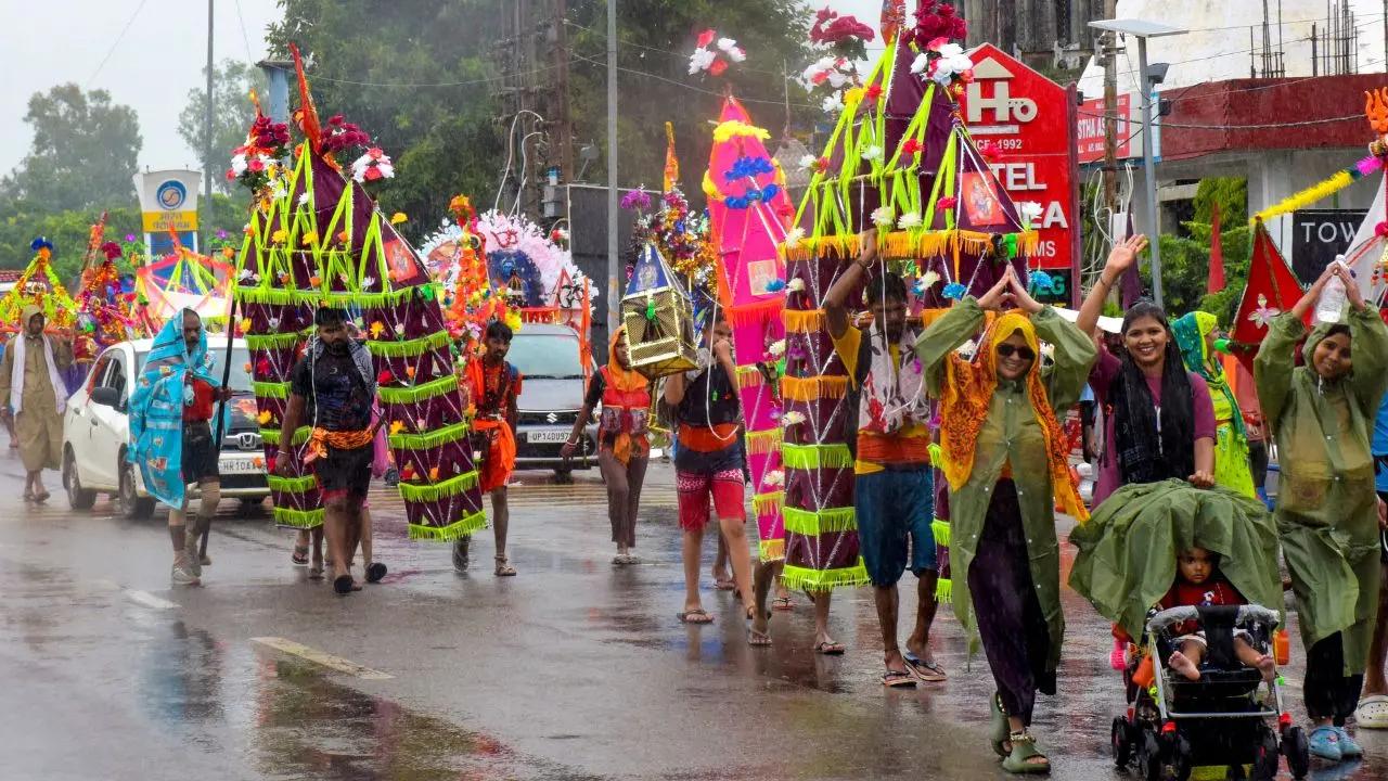 Faith and devotion mark the Kanwar Yatra as devotees travel long distances carrying holy water