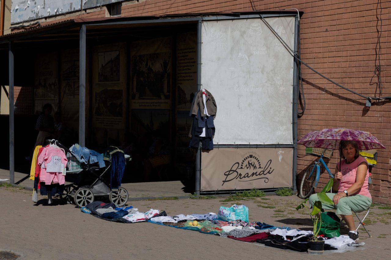 A street vendor sells her wares under a umbrella in Berehove on August 28, 2026, amid the Russian invasion of Ukraine A street vendor sells her wares under a umbrella in Berehove on August 28, 2026, amid the Russian invasion of Ukraine