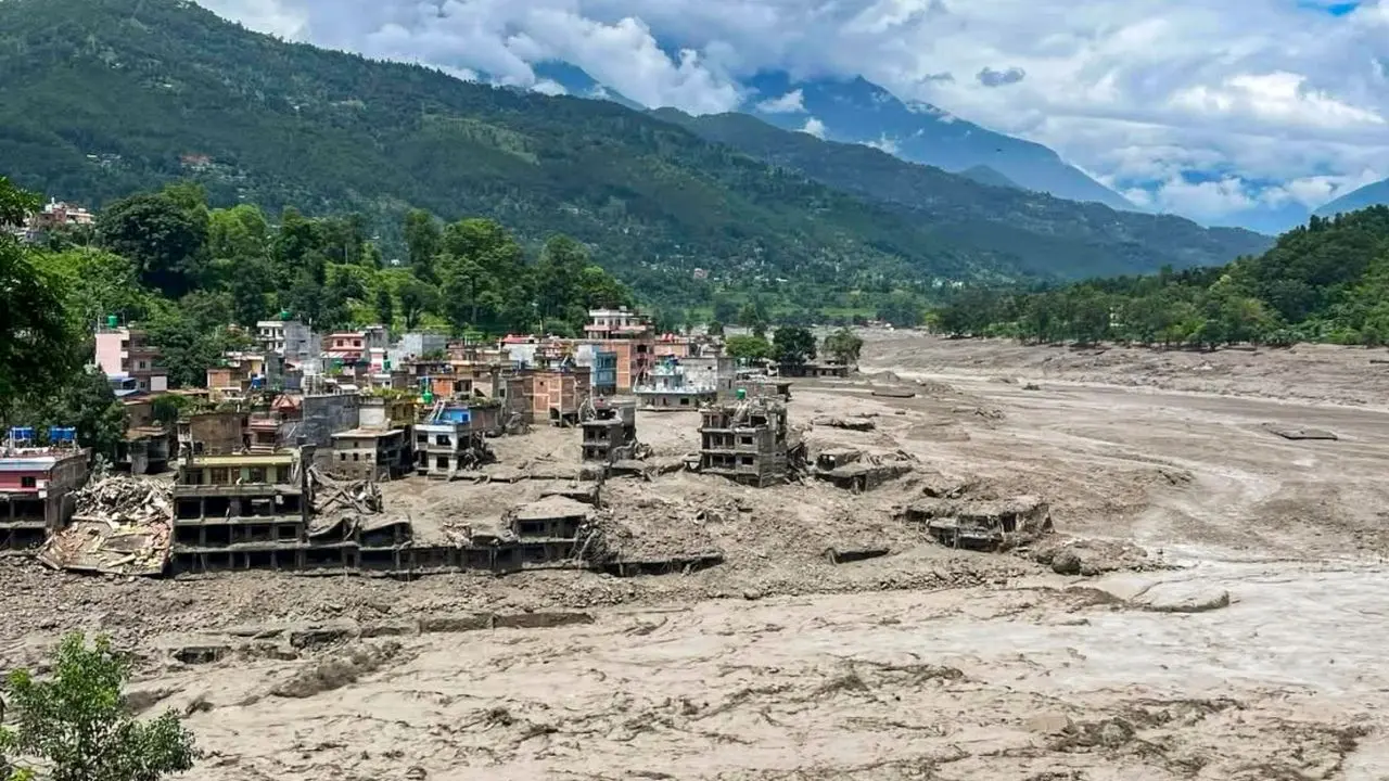 Nepal floods: Indian Embassy issues emergency helplines after over 100 citizens reported to be missing A torrent of muddy water flows through the Trishuli River following a flash flood triggered by the Lende river, and merges into the Bhote Koshi river, in Trishuli, Nepal.(PICS/PTI)