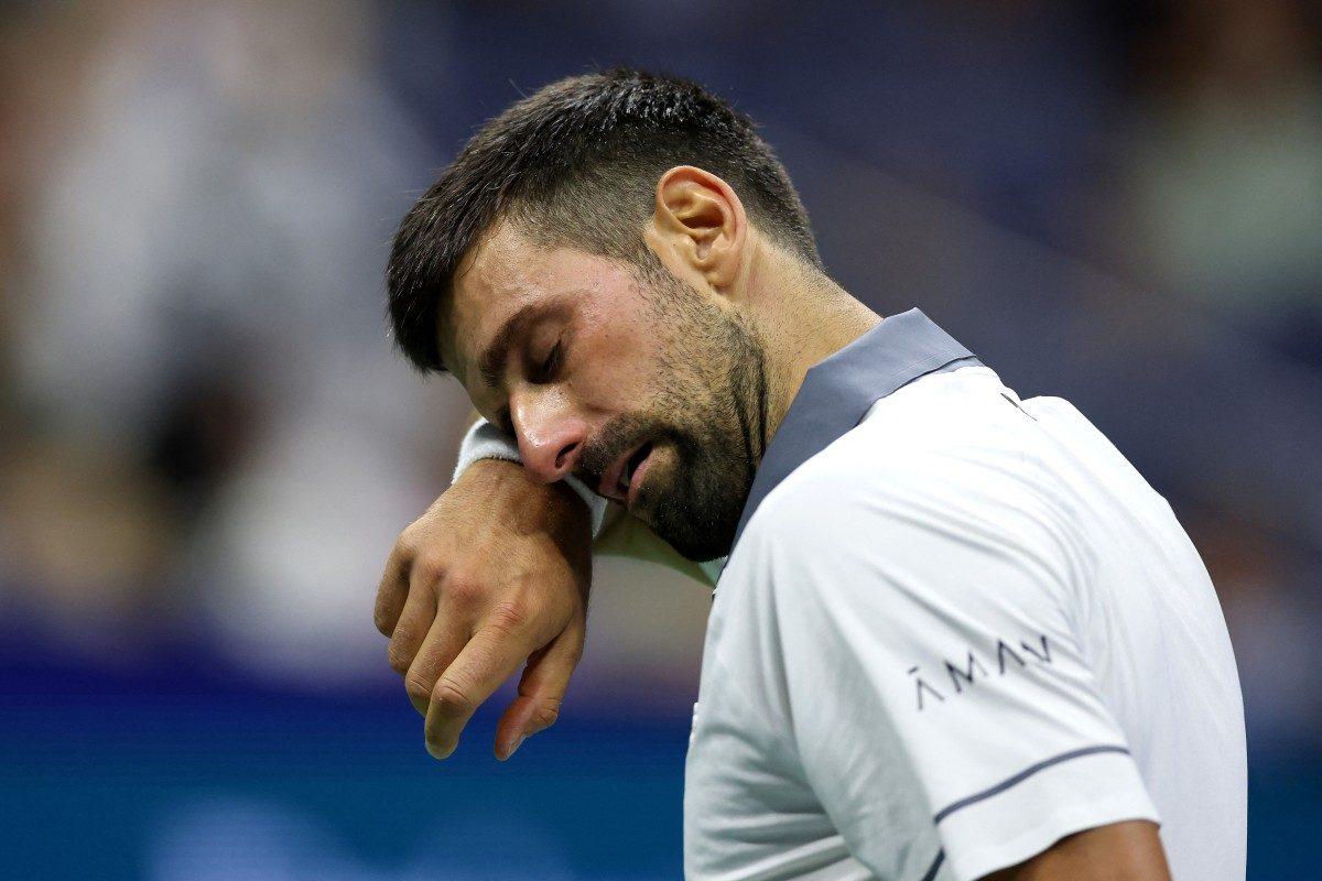 Novak Djokovic broke down in tears as his US Open campaign ended with a first-round defeat to Mariano Navone, as the Serbian's push for a 25th Grand Slam title ended early
