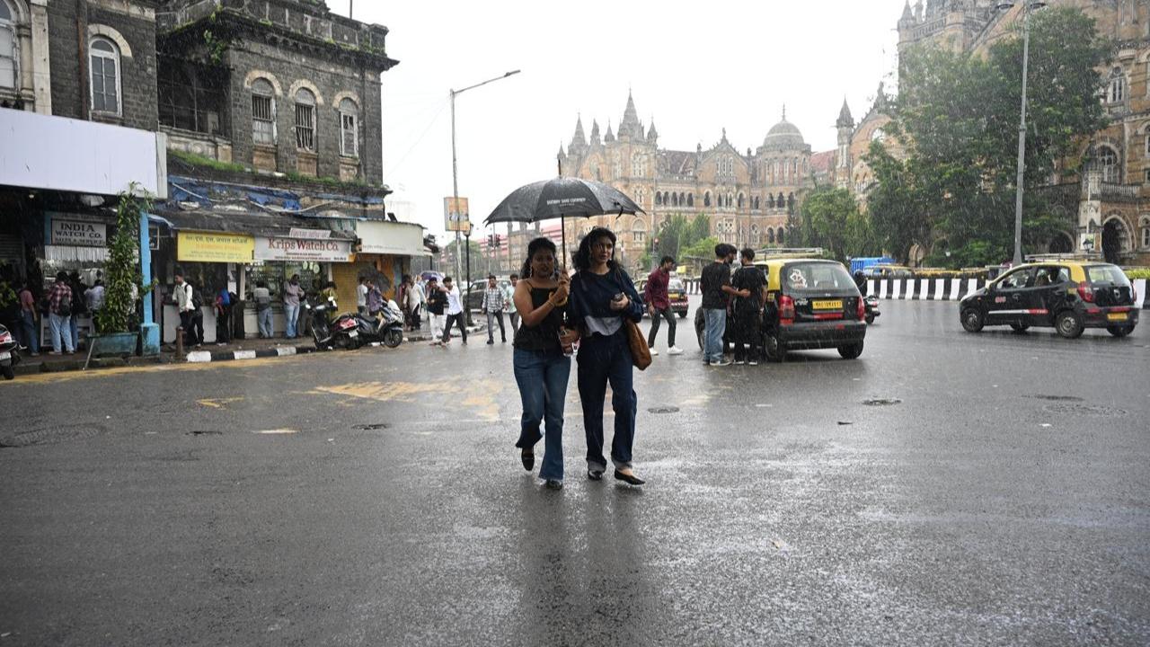 Commuters were seen navigating wet roads and waterlogged stretches in some parts of the city