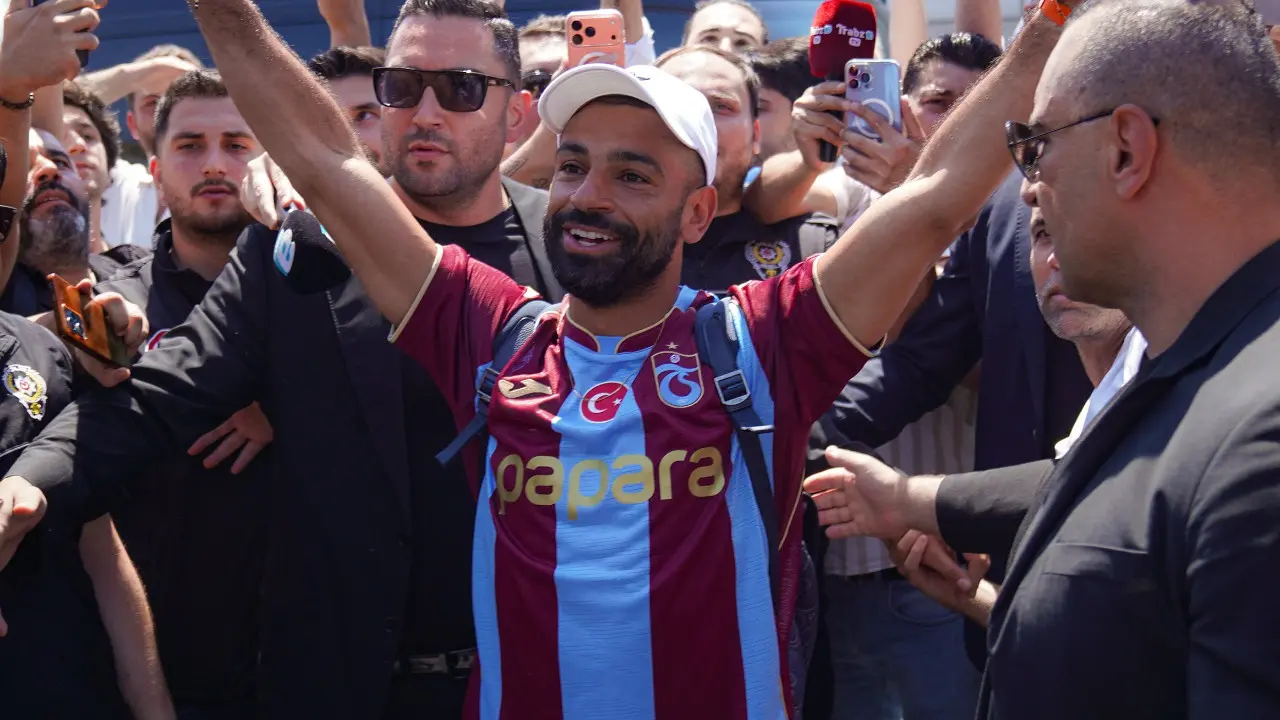 In Photos: Former Liverpool star Mo Salah signs for Turkish giants Trabzonspor Mo Salah with Trabzonspor fans (Pic:X/Trabzonspor)