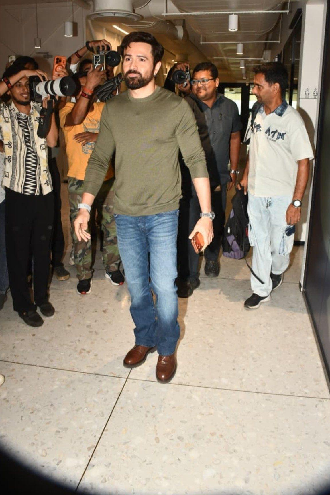 Bollywood actor Emraan Hashmi was spotted keeping it stylish yet effortless in fitted olive green  sweatshirt with denim.