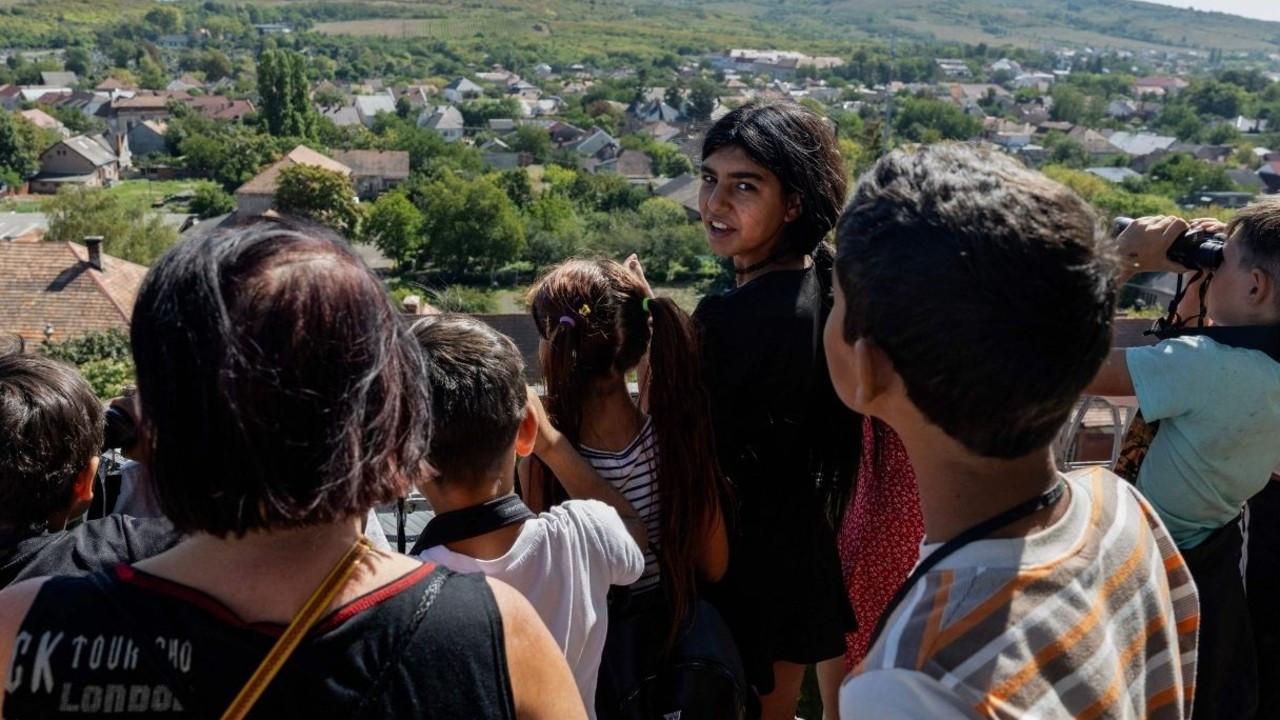 Children from a Romani school take in the view from the observation terrace of the Church of the Exaltation of the Holy Cross in Berehove.(PIC/AFP)