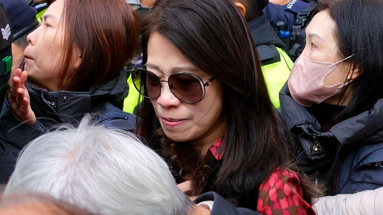 Teresa Lai was grim-faced during the hearing and made no comment as she left the court, but their children, who live abroad, condemned the sentence in a statement