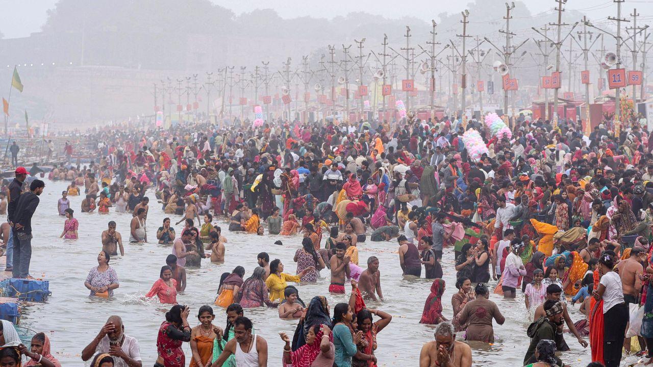 People take a holy dip at Sangam during the ongoing Magh Mela 2026, in Prayagraj, Uttar Pradesh