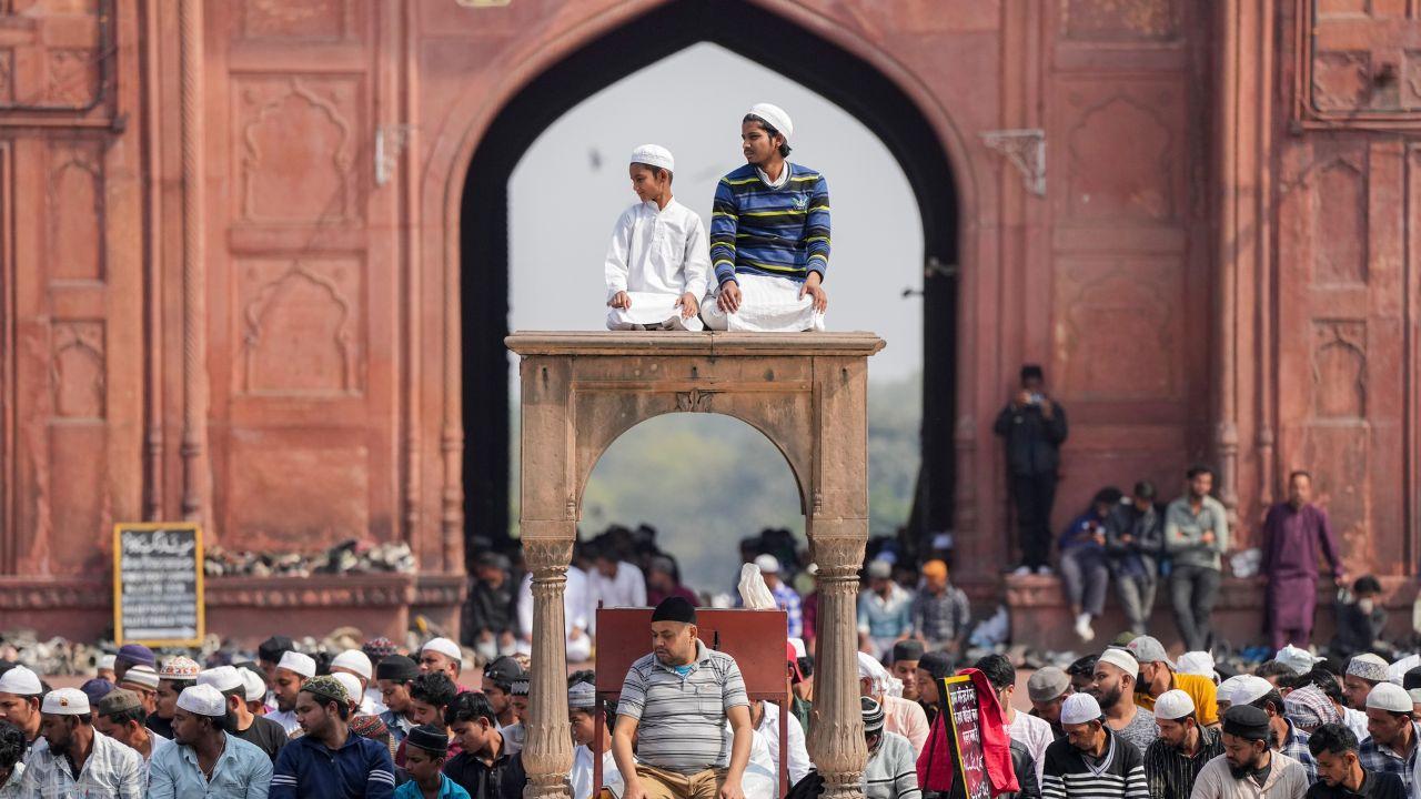 Namaz (also called Salah) is the Islamic prayer offered by Muslims five times a day. It includes specific physical postures such as standing, bowing, and prostrating while reciting verses from the Quran