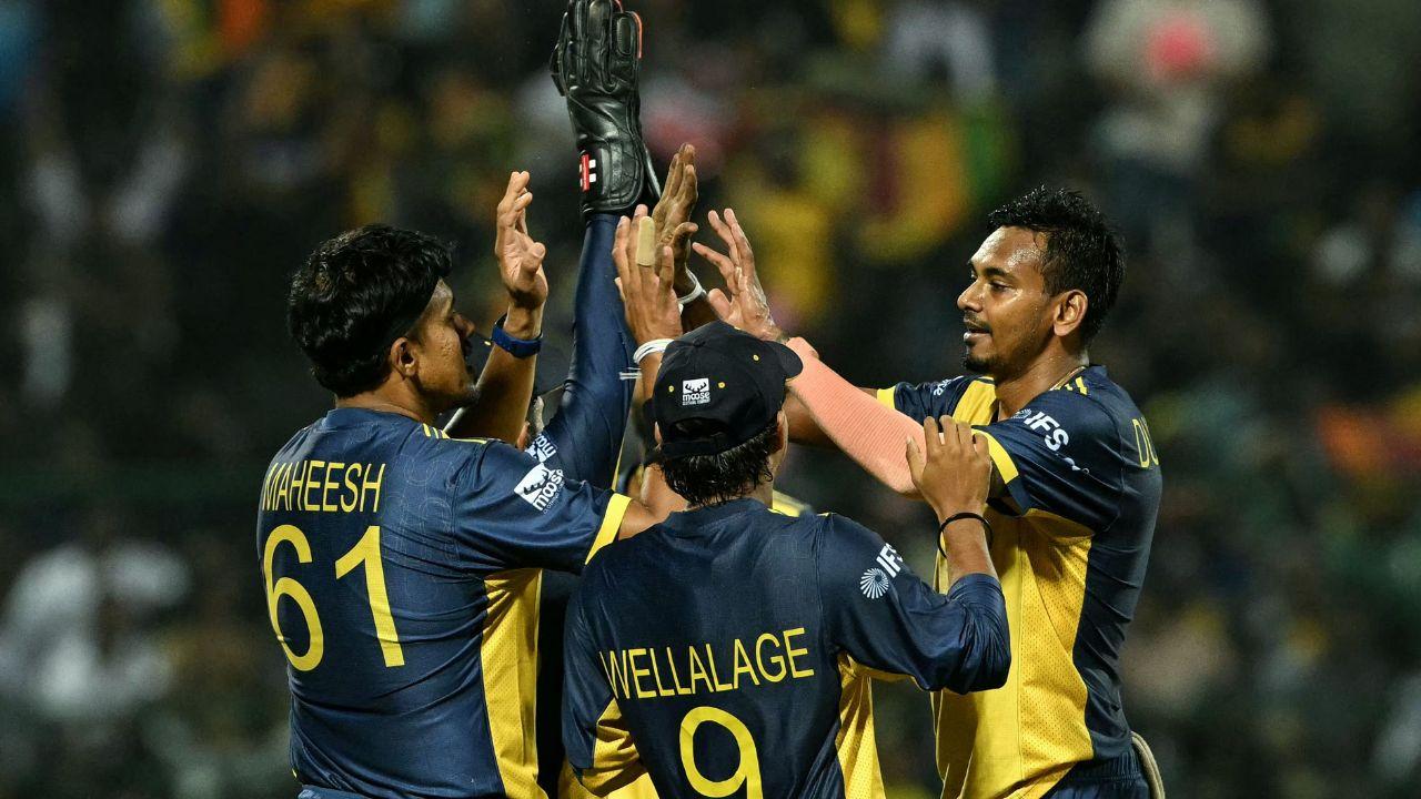 <p>Sri Lanka`s Dushmantha Chameera (R) celebrates with Maheesh Theekshana (L) and Dunith Wellalage after taking the wicket of Australia`s Marcus Stoinis <em><strong>(Pic/AFP)</strong></em></p>