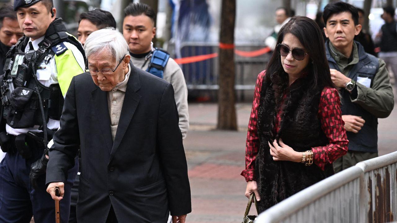Teresa Lai (R), wife of convicted pro-democracy media tycoon Jimmy Lai and Joseph Zen, retired cardinal of the Catholic Church (L), arrive at the West Kowloon Magistrates Court for Jimmy Lai's sentencing