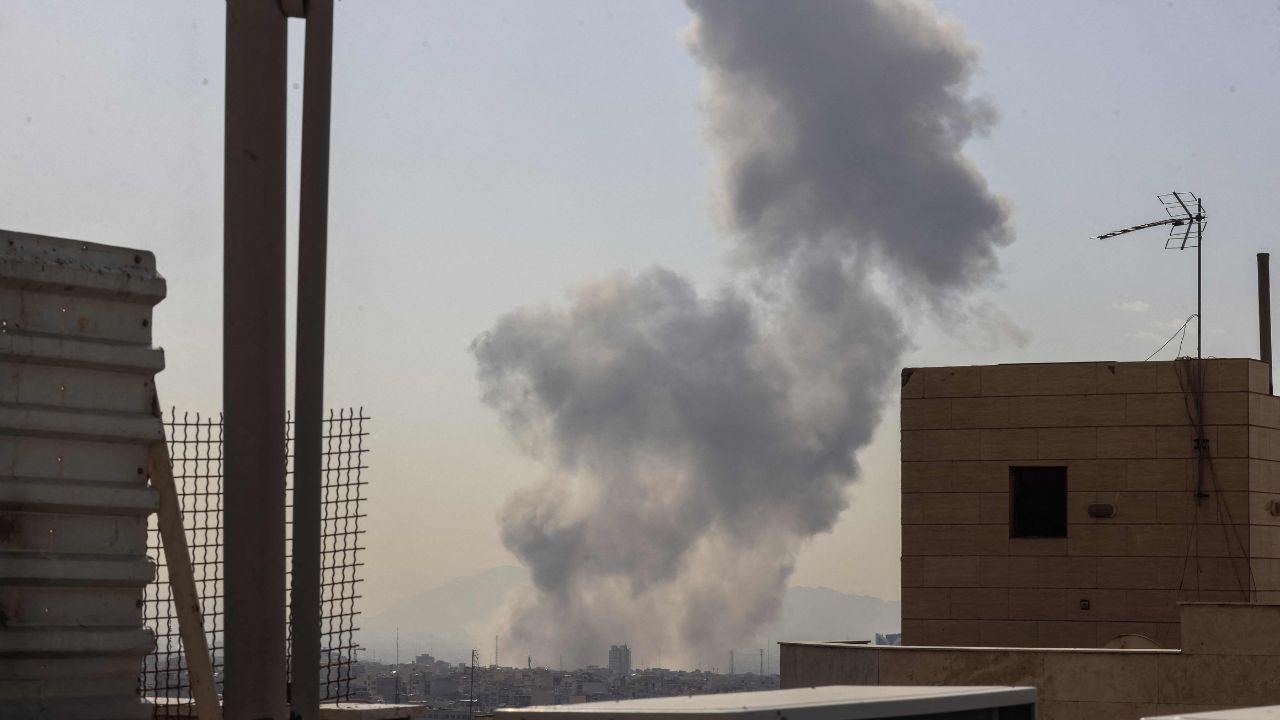 Authorities in Tehran shut down key roads and close airspace as additional blasts echo across the city, while neighboring Iraq also suspends flights amid the escalating regional crisis
