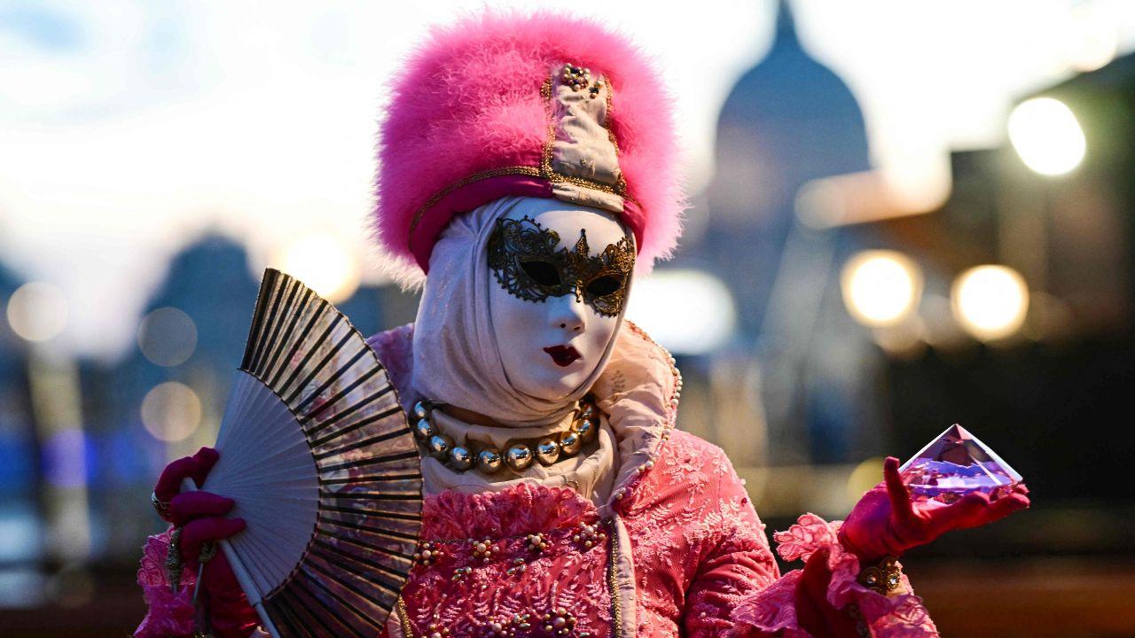 <p>Masked performers showcased traditional Venetian costumes, blending centuries-old craftsmanship with the festival&rsquo;s Olympic-inspired theme</p>