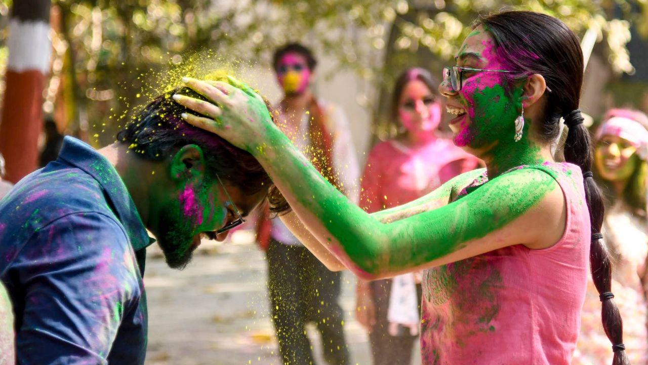 Students in Patna celebrate with colours at the College of Arts and Crafts, reflecting the festive mood sweeping Bihar before the official dates