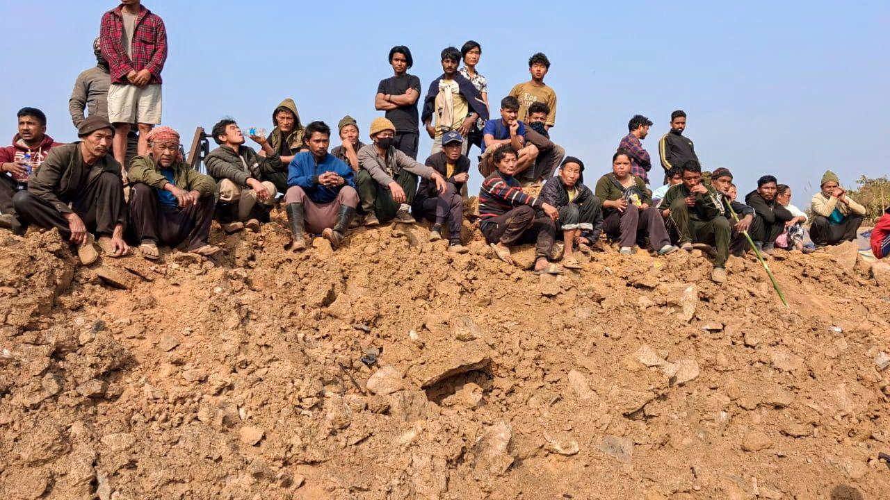Family members and locals gathered at the site, mourning the deceased and watching ongoing search and rescue efforts