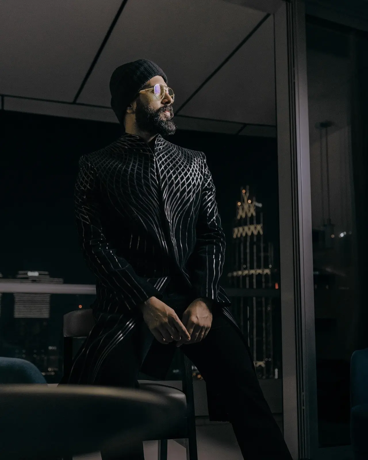 Vijay Deverakonda looks effortlessly cool in a black kurta set with subtle shimmer detailing that adds a hint of shine to the outfit. The simple yet stylish kurta keeps the look classy and minimal. 