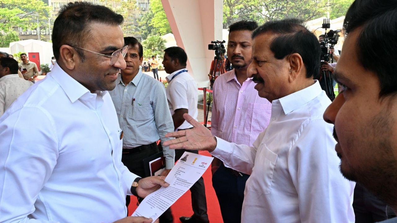 Samir Meghe and Forest Minister Ganesh Naik during the Maharashtra Budget Session 2026 at Vidhan Bhavan in Mumbai