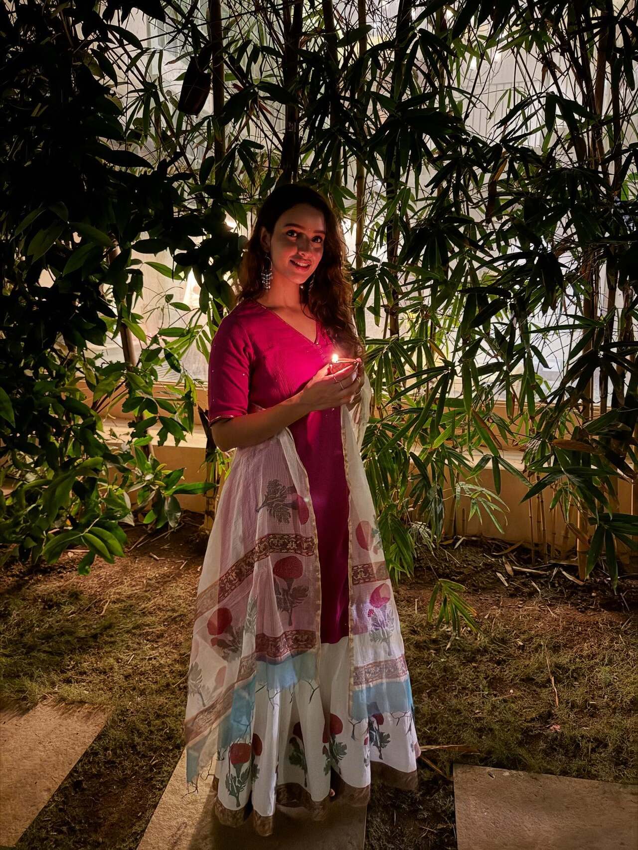 Simplicity stands out, and Triptii Dimri shows how to do it in an elegant outfit with floral patterns. One can always choose to accessorise it with jhumkis, tassels or dangling earrings, and a few kadas to keep it statement.