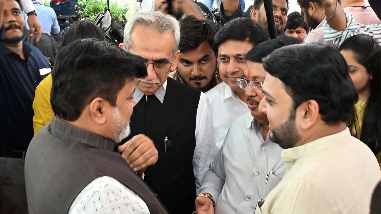 Maharashtra Cabinet Minister for Industries Uday Samant and Congress leader Vijay Wadettiwar make their way into Vidhan Bhavan marking the commencement of the state’s annual budget discussions.