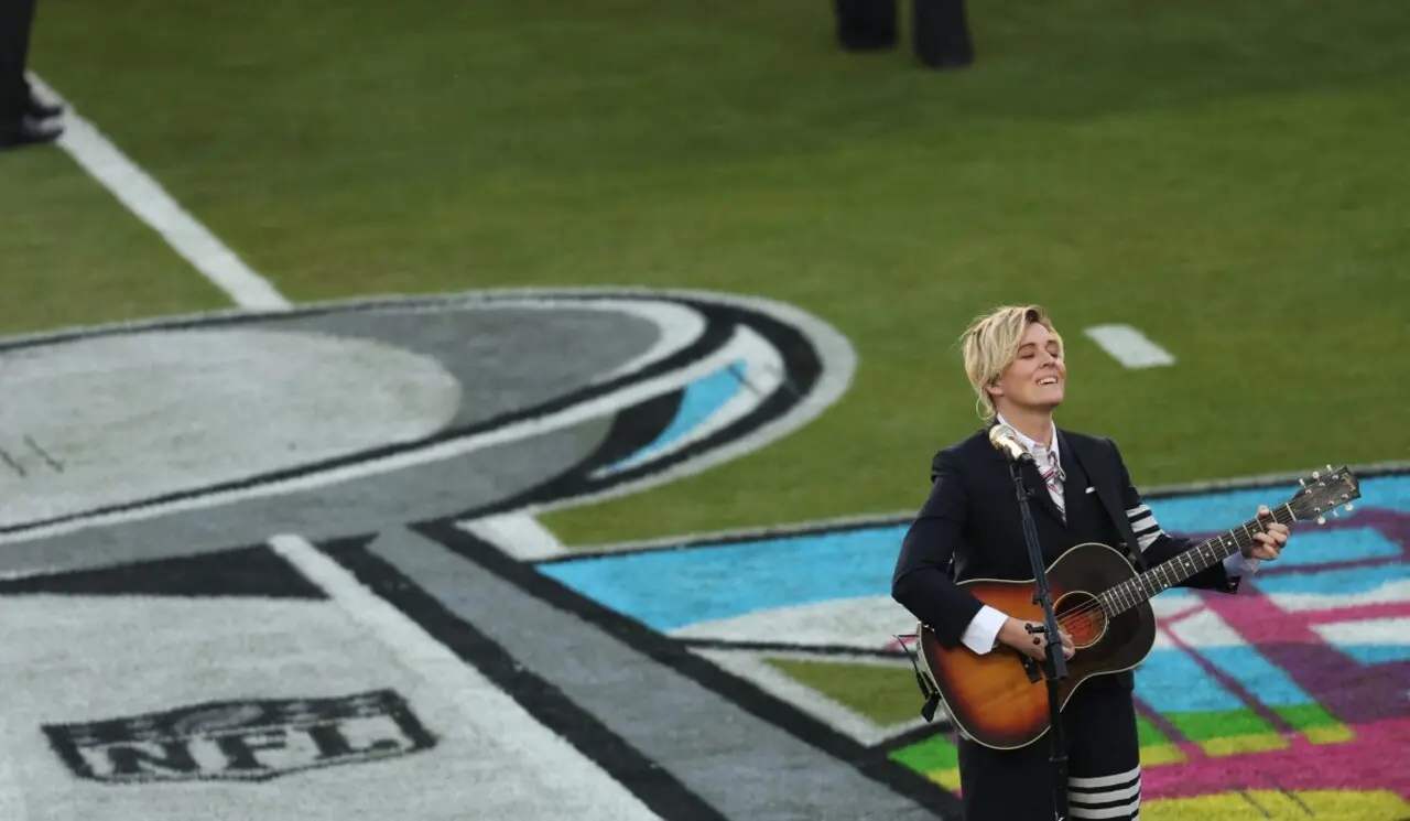 Brandi Carlile took to the Super Bowl LX stage at Levi’s Stadium on Sunday during the pre-game performance. The Grammy Award-winning singer sang a rendition of “America the Beautiful.”