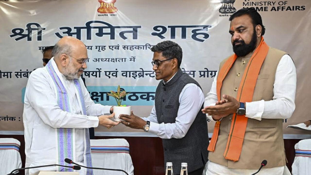 Union Home Minister Amit Shah with Bihar Deputy Chief Minister Samrat Choudhary and others during a review meeting for the progress of the Vibrant Villages Programme, in Araria district. Pic/PTI