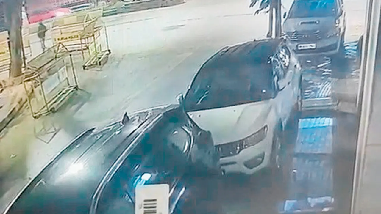 CCTV footage shows suspected shooter walking towards Shetty Tower moments before opening fire. Pics/By Special Arrangement